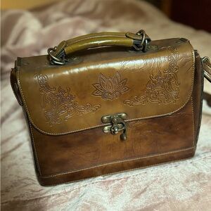 Vintage embossed satchel / crossbody / handbag. Color Brown
